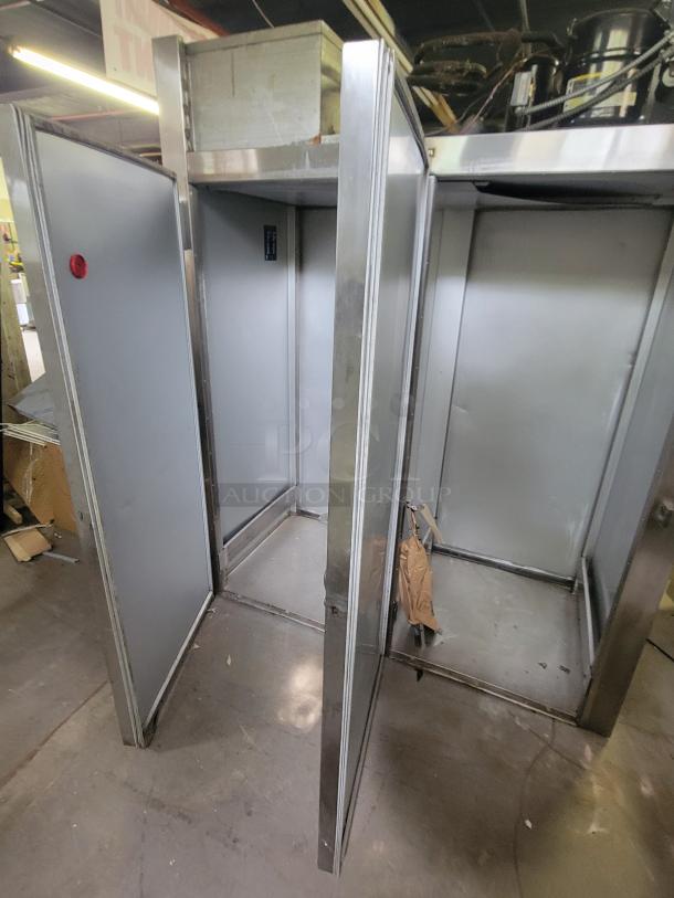 Traulsen AR1-2-32 LPUT two-door pass-through refrigerator, robust design, ideal for high-traffic kitchens, used condition.