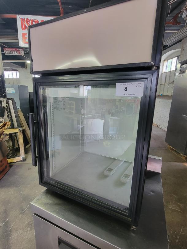 True GDM-05 countertop merchandiser refrigerator, glass front, black trim, excellent condition, ideal for impulse buys.
