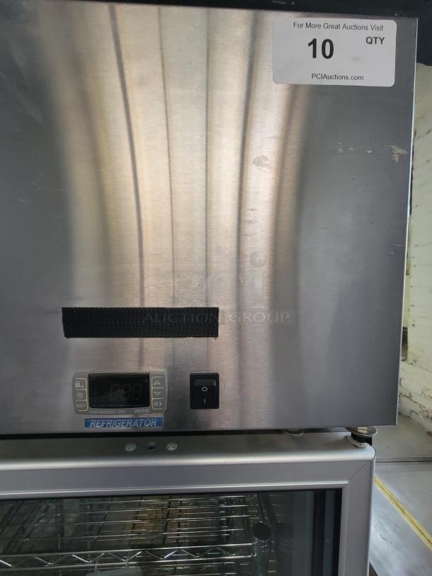 Master-Bilt Endura 6-Door Refrigerator, model MNR806SSG/0, with digital display and rack storage. Excellent condition.