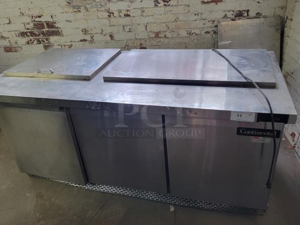 6' Continental SW72-30M refrigerated prep table. Stainless steel, commercial-grade, dual doors. Ideal for food service.