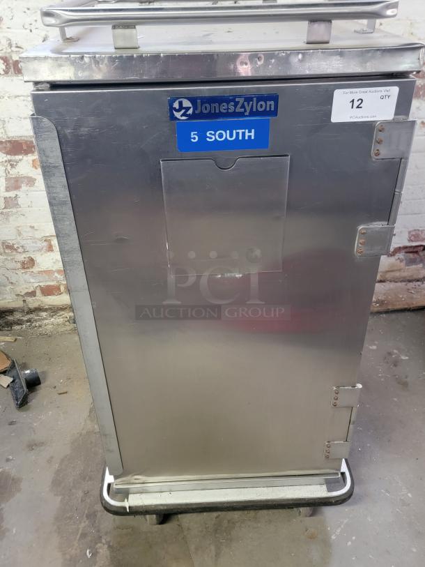 Jones Zylon ETC-UA-7 insulated meal delivery cabinet, institutional-grade, stainless steel, labeled "5 SOUTH", auction tag visible.