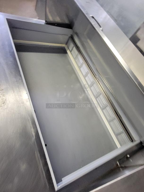Beverage-Air SPE72HC-30M Mega Top Prep Table, open lid view, stainless steel, excellent condition, spacious interior.