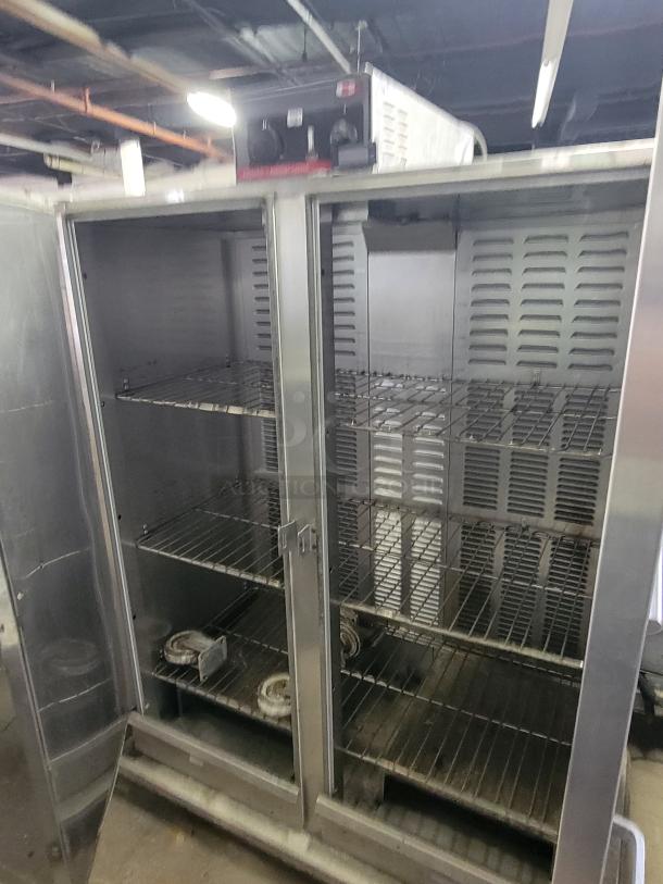 Carter-Hoffmann heated holding cabinet, model THU000000A, open doors, stainless steel, multiple shelves, ideal for catering.
