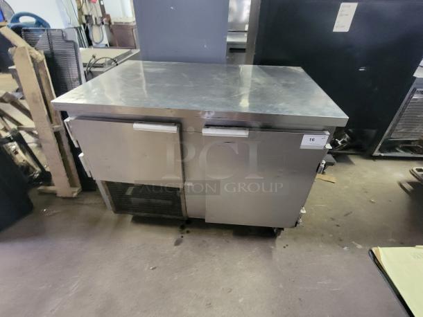 Leader LB48S/C undercounter fridge/freezer with top work surface, refrigerated drawers, and door compartment, in used condition.