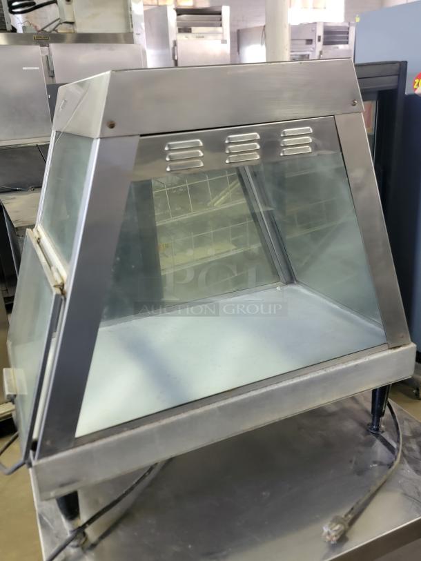 Merco Model 1220-1P countertop food warmer and display case with glass design and adjustable heat controls. Ideal for cafes.