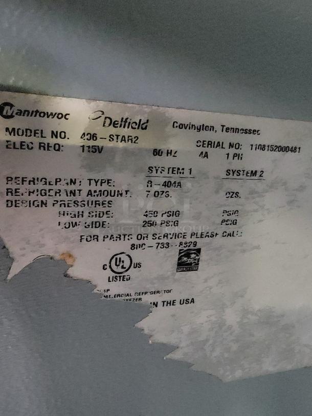 Close-up of a Manitowoc Delfield undercounter refrigerator label, Model 436-STAR2, highlighting specifications and UL listing.