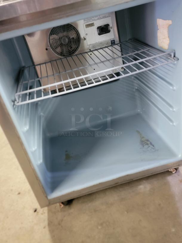 Manitowoc Delfield 436-STAR2 undercounter refrigerator, stainless steel, single wire shelf, fan, used condition, ideal for tight spaces.