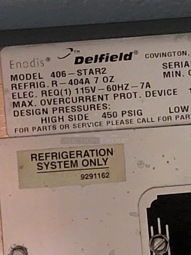 Label on Manitowoc Delfield Undercounter Refrigerator, Model 436-STAR2, showing technical specifications and refrigeration system notice.