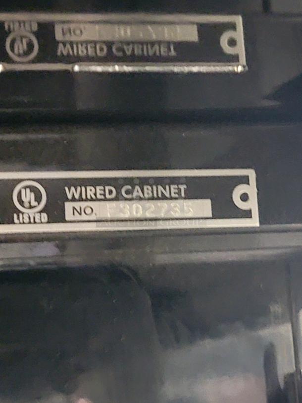 Federal Industries Model SB28SS lighted display case UL label, wired cabinet No. E302735.