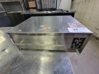 Wisco 1502 countertop oven, digital controls, missing 3 legs, scratches, fixer-upper. Auction tag visible.