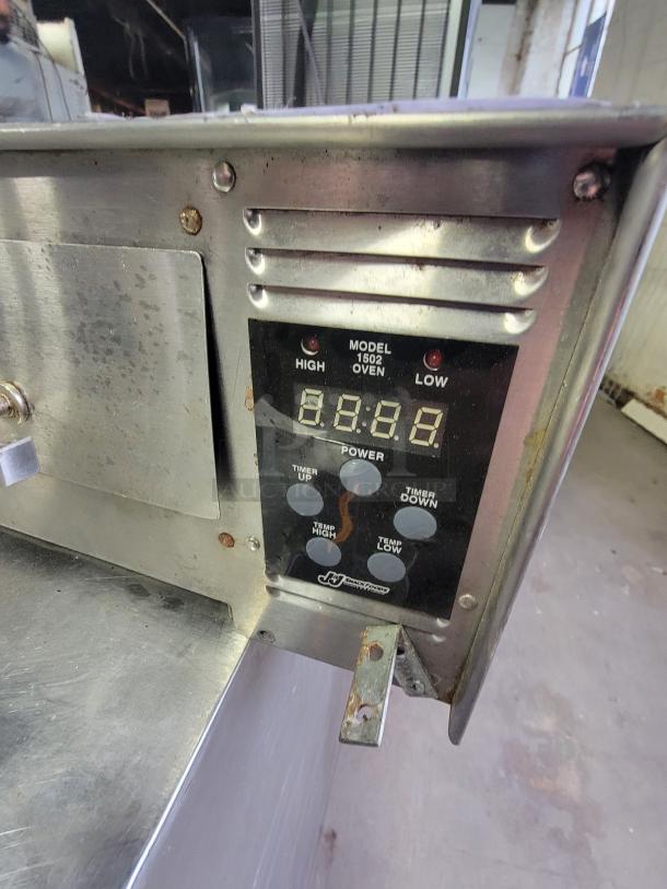 Wisco 1502 countertop oven, digital controls visible, missing 3 legs, ideal for repair project, commercial use.