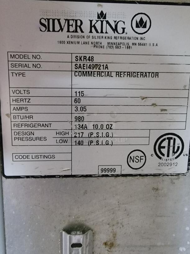 Silver King SKR48 stainless steel commercial refrigerator label, 115 volts, 60 hertz, 980 BTU/hr, NSF and ETL listed.