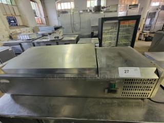 Avantco 40" refrigerated countertop prep rail in stainless steel. Excellent condition, improves kitchen efficiency. Label: Auction ID 27.
