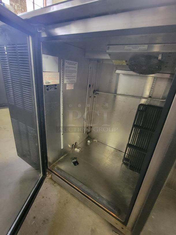 Cospolich 5' Glass Tender with sliding glass doors. Refrigerated unit ideal for bars, visible interior cooling components, good condition.