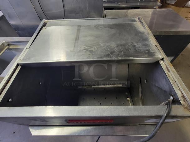 Vulcan VCD5-1 commercial countertop food warmer, stainless steel, visible wear, occasional door hinge issue.