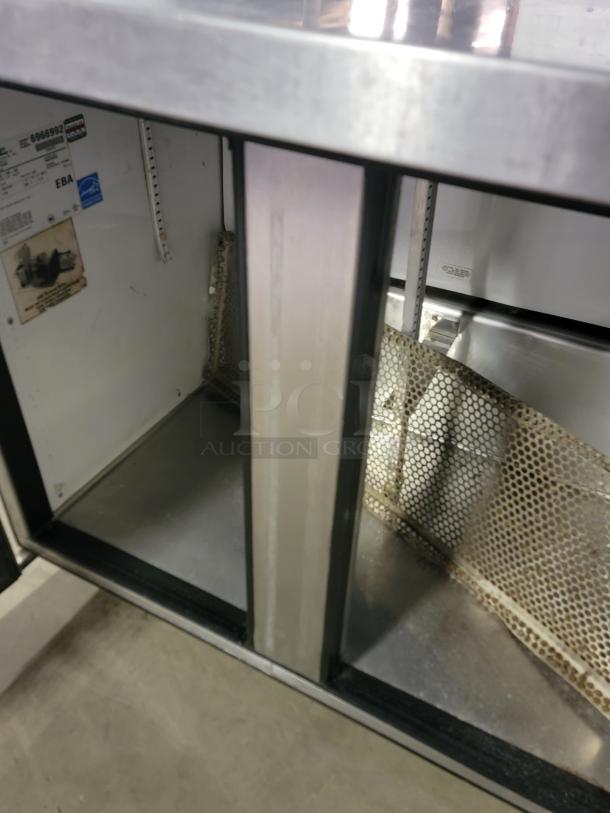 True TUC-36-34 commercial refrigerator, stainless steel, undercounter style, visible labels, clean interior condition.