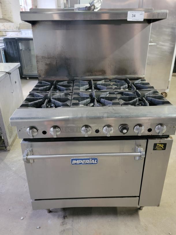 Imperial IR-6 commercial 6-burner gas range with oven, stainless steel, ideal for busy kitchens, used condition.