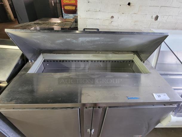 Fagor FST-48-12 refrigerated prep table, stainless steel, open top, good condition, ideal for ingredient storage.