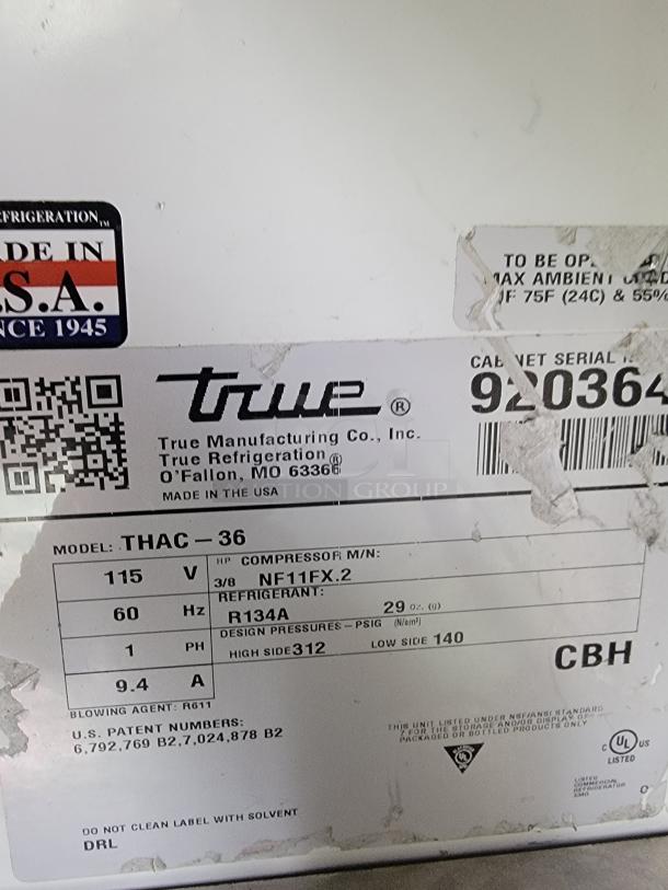 True Refrigerated Display Case, model THAC-36. Features 115V, R134A refrigerant, ideal for showcasing chilled items. Made in USA.