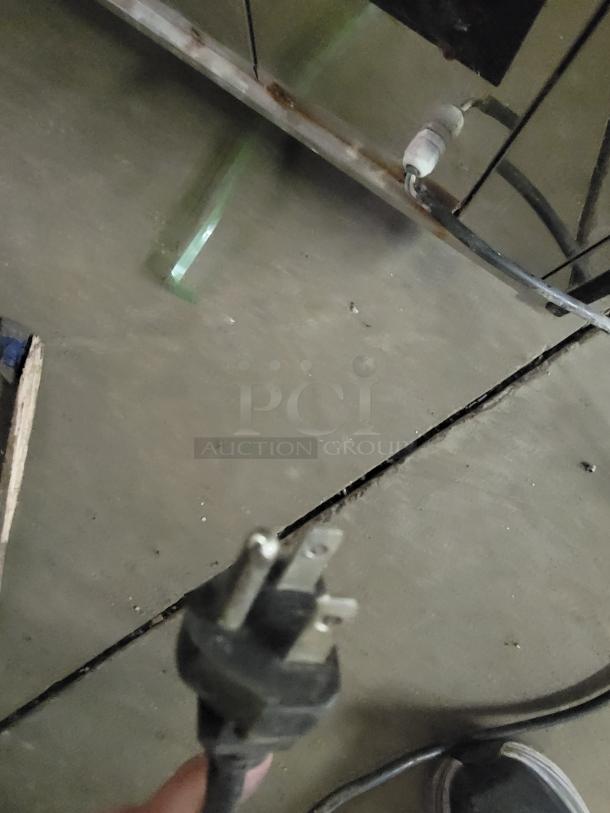 Plug and cable for 69" refrigerated display case; side glass panels cracked, require repair.