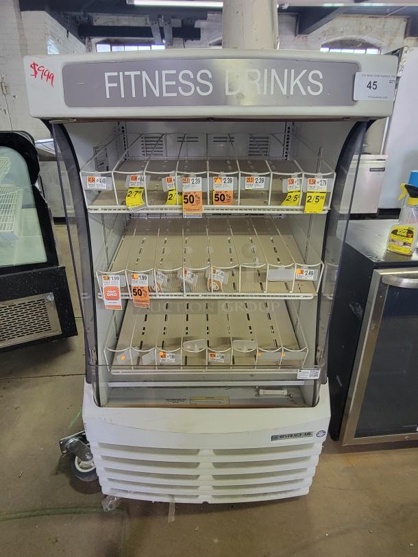 Beverage-Air BZ13-1-W vertical display fridge, open-front, commercial use. Marked "FITNESS DRINKS," price tag $999.