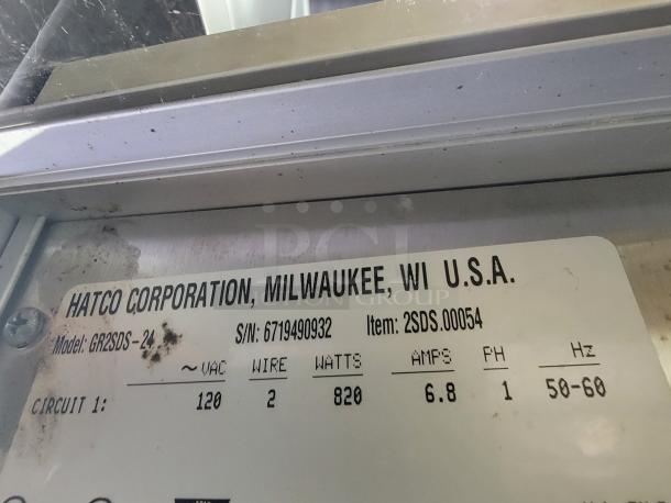 Hatco Glo-Ray food warmer, model GR2SDS-24. Pass-thru design, tag shows 120 VAC, 820 watts, made in USA.