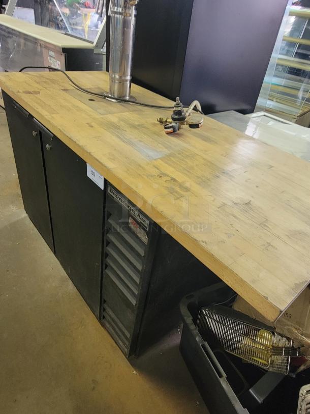 Custom Beverage-Air BB48 kegerator with multi-tap setup, wooden top, and tap tower. Ideal for home or commercial use.