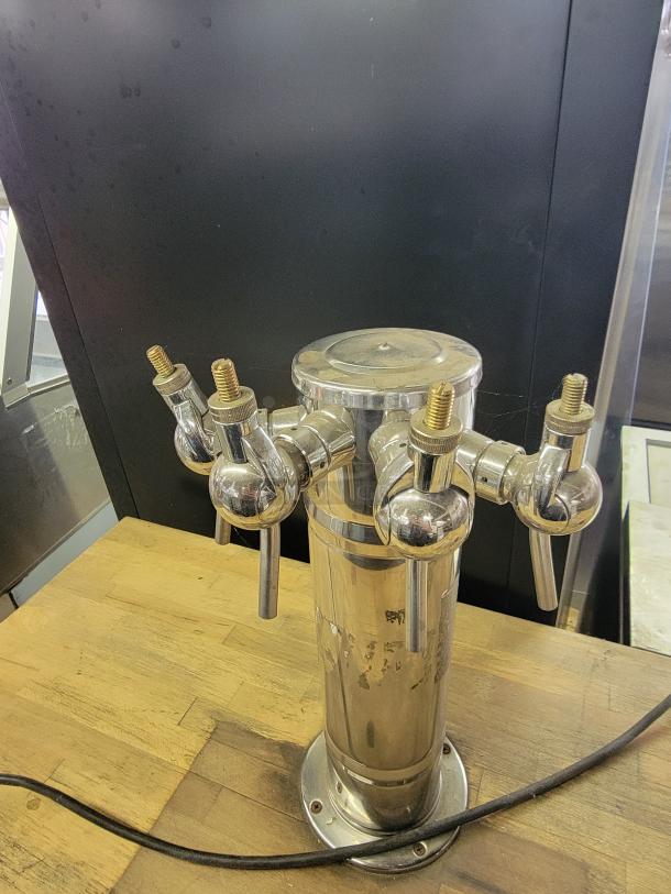 Beverage-Air BB48 kegerator setup with multi-tap tower on custom wooden top, ideal for bars and man caves.