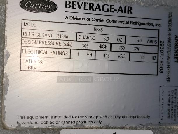 Beverage-Air BB48 kegerator setup with custom wooden top, tap tower. Professional-grade, ideal for home or commercial use.