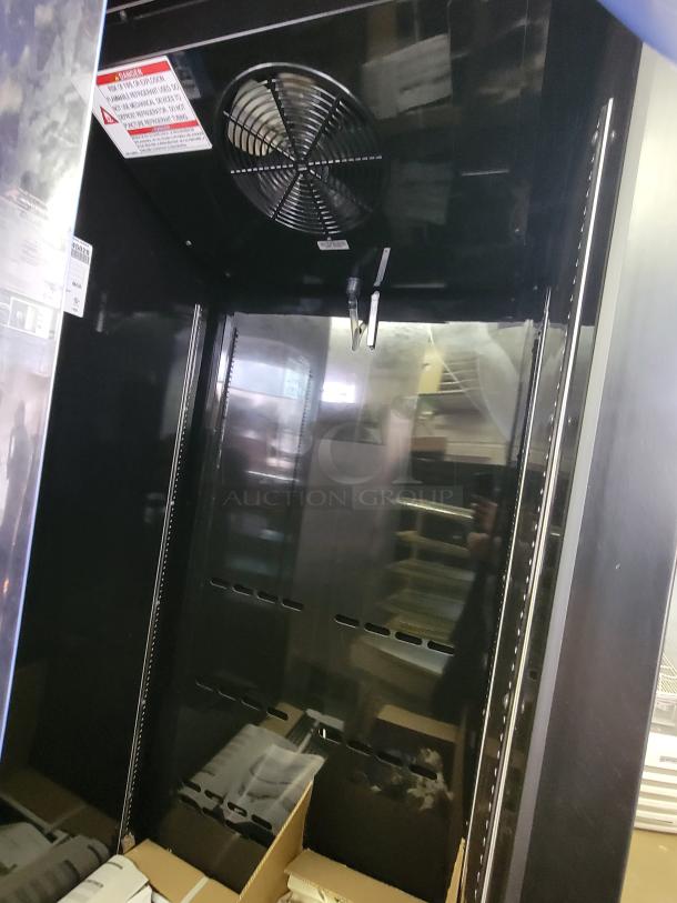 True Refrigeration display cooler, model CVM-27-HC, interior view, new scratch and dent condition, ideal for cold drinks.