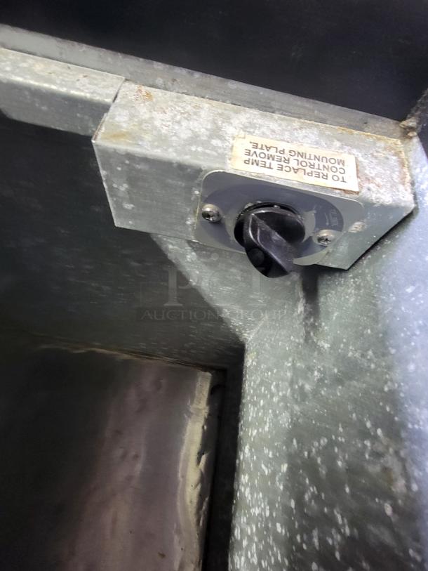 Stajac Industries HBC-25 ice cream dipping cabinet interior with temperature control panel, slight wear visible.