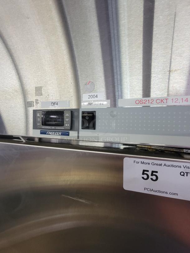 Stainless steel Norlake commercial reach-in freezer, model NX211SMS/8, features digital controls and power switch.