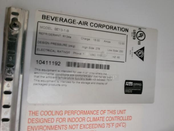 Beverage-Air BZ13-1-B vertical display refrigerator label showing refrigerant type, electrical ratings, and usage instructions.