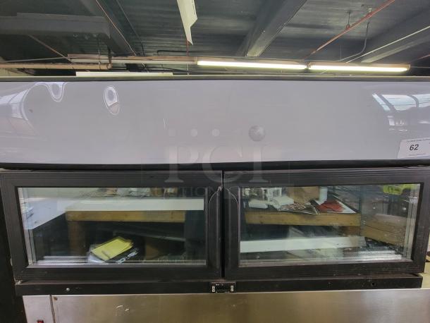 MTL Cool Countertop Freezer DDF-90 with glass doors in used condition, stainless steel exterior, auction tag number 62 visible.