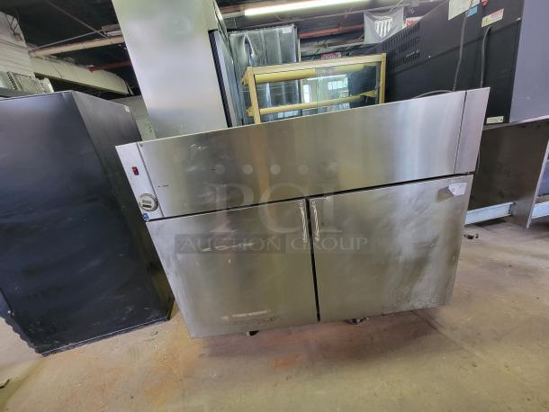 Franke 7RF02 commercial wall mount stainless steel freezer, durable for high-capacity storage, ideal for restaurants and delis.