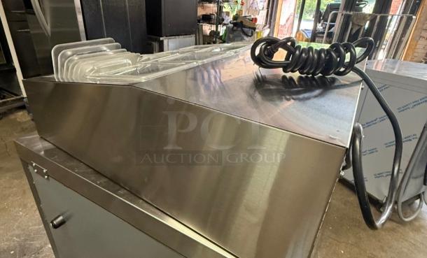 Arctic Air ACP8SQ refrigerated prep rail, like-new condition. Stainless steel finish, ideal for toppings and ingredients.