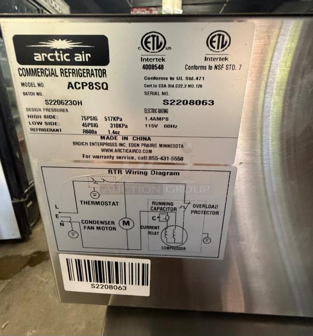 Arctic Air ACP8SQ refrigerated prep rail, like-new condition, model label visible with specifications and wiring diagram. Ideal for restaurants.