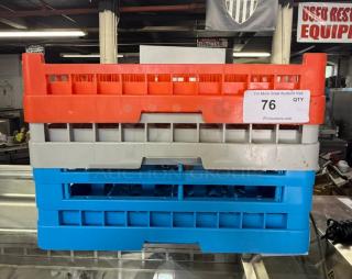 Three 19x19 commercial dishwasher racks in red, gray, and blue. Perfect for restaurant use. Tag indicating auction lot 76.