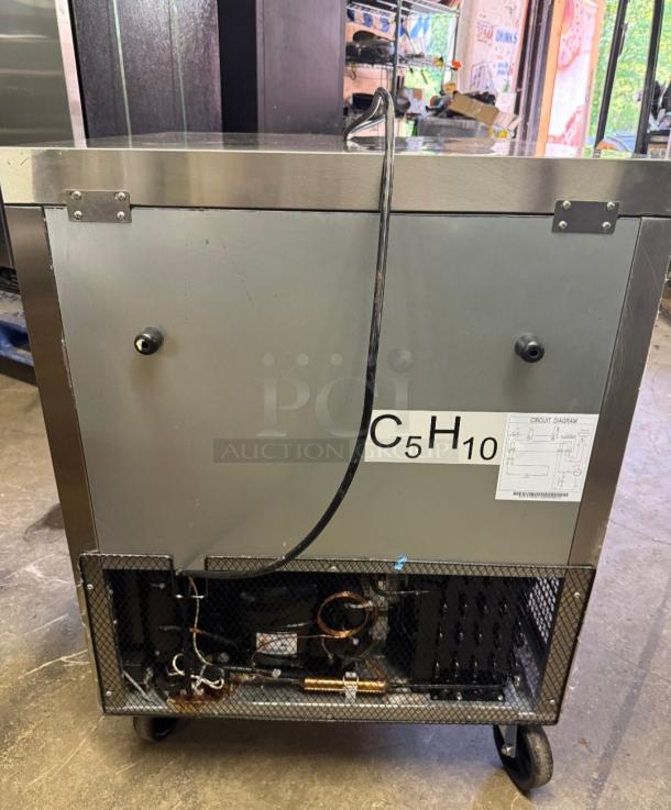 Bison BUR-27 commercial refrigerator, undercounter style. Features stainless steel design, circuit diagram visible. Ideal for businesses.