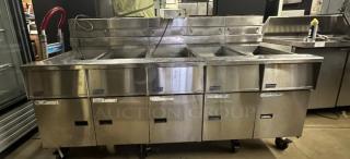 ✨ PITCO 4 BANK FRYER BATTERY W/ DUMP & FILTER SYSTEM! ✨ Elevate your kitchen's efficiency with this Solstice Supreme gas fryer battery! Perfect for high-volume commercial kitchens, this unit combines robust frying power with advanced oil management features for superior performance and cost savings. - Item #1204399