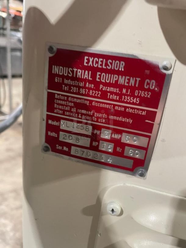 Excelsior XL125B commercial spiral bagel mixer label, showing 208V, 3-phase, serial number 870214. Model info and electrical specs.