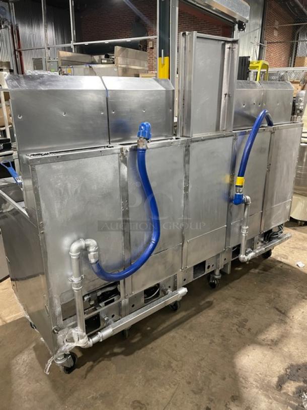Pitco FGSGH50 commercial stainless steel 4-bay natural gas fryer system with basket hangers, backsplash, oil filter, and gas hose.