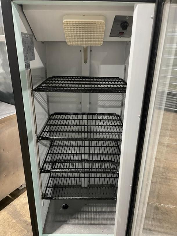 Avantco commercial reach-in merchandiser refrigerator, model 178GDC10, black with glass swing door, coated wire racks, on legs.