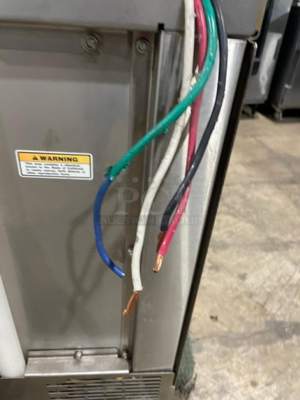 Hobart LX30H commercial dishwasher, stainless steel with exposed wires. Model and warning labels visible. 120/208V, 1 phase.