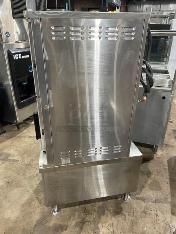Southbend SX55EC dual compartment convection steamer, stainless steel, enclosed cabinet base, 208V 3 phase, on legs.