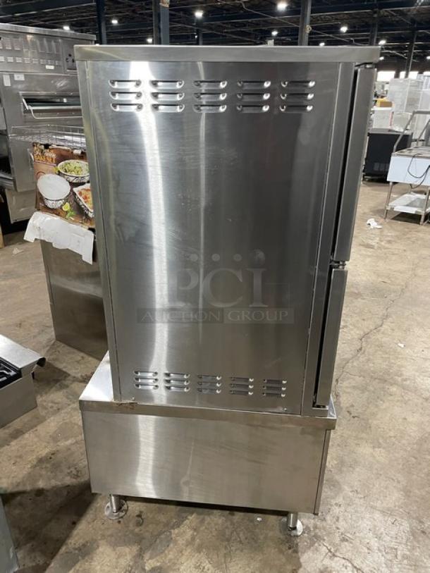Southbend SX55EC dual compartment convection steamer, stainless steel, with enclosed cabinet base, on legs, 208V 3-phase.