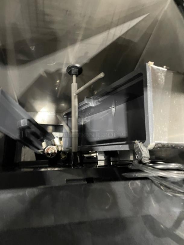 Lancer Model 4500 stainless steel 6-flavor beverage/ice dispenser interior view. Electric-powered, commercial-grade.