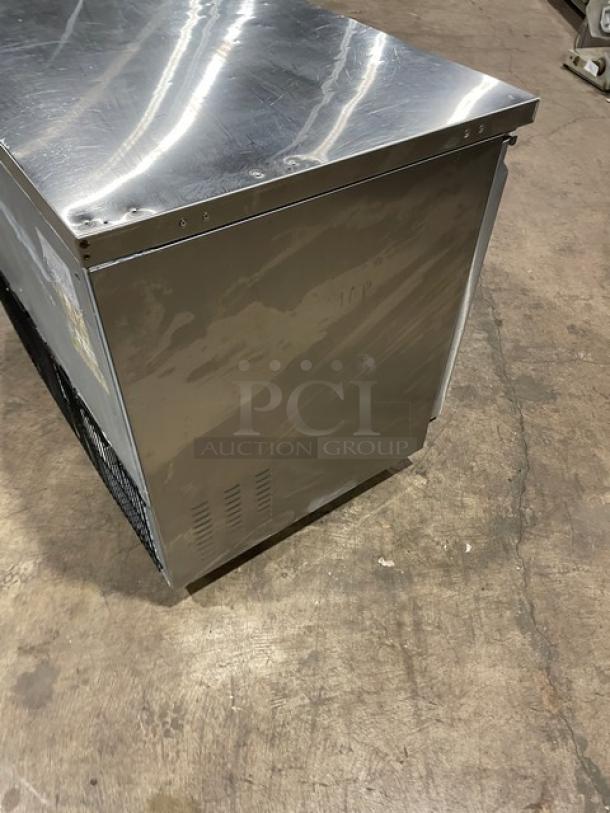 Entree UR48 stainless steel 2-door undercounter refrigerator, poly coated wire racks, 115V, on casters, good condition.