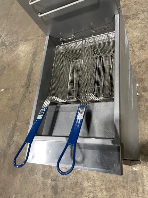Globe GFF35G stainless steel deep fat fryer with back splash, basket hanger, and fry baskets on casters. New condition.