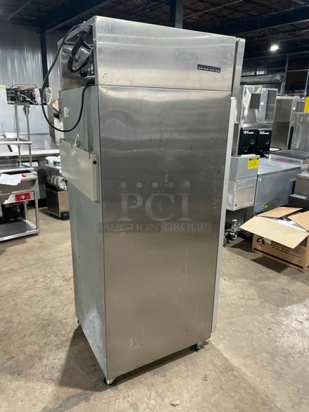 Hoshizaki CF1SFS single door stainless steel freezer with poly-coated wire racks, 115V, on casters, in used condition.
